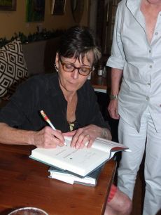 Lisa Howorth signing Flying Shoes